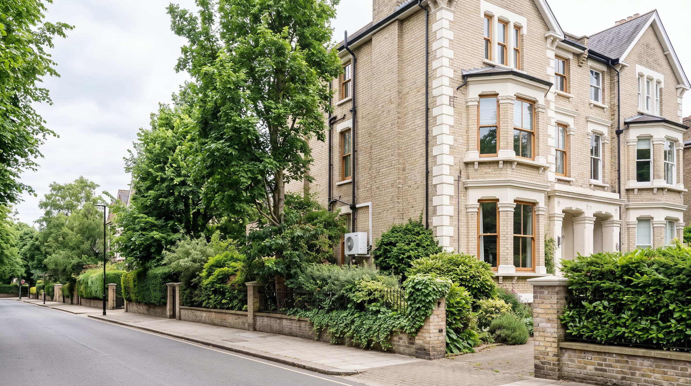 Victorian villas with gardens on a quiet road near the river in Richmond upon Thames